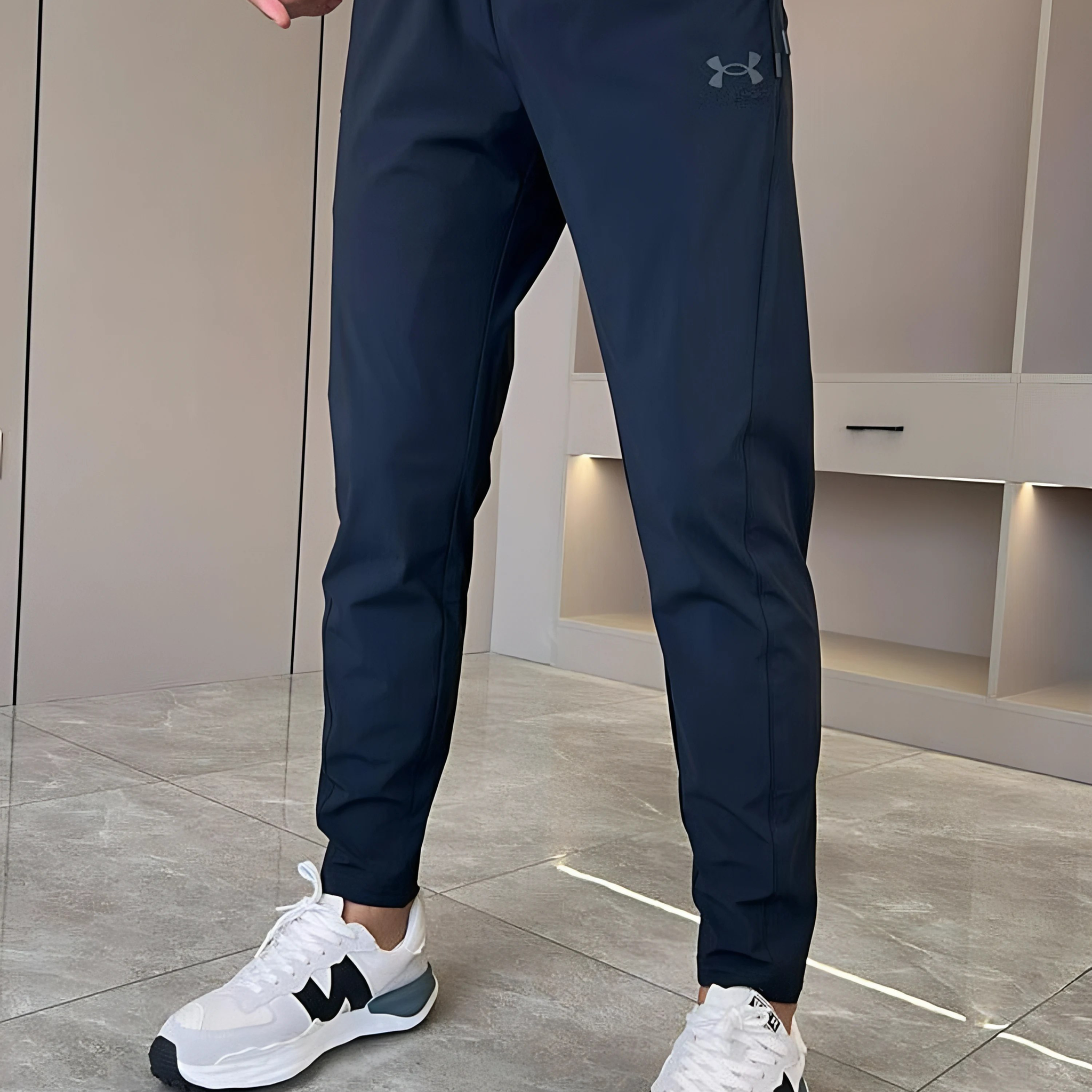 Under Armour : Pantaloni asciutti super elasticizzati unisex